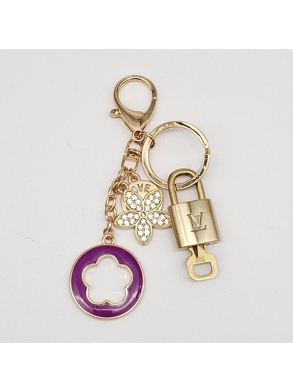 Authentic Louis Vuitton Lock & Key with Unbranded Flower Charm, Keychain